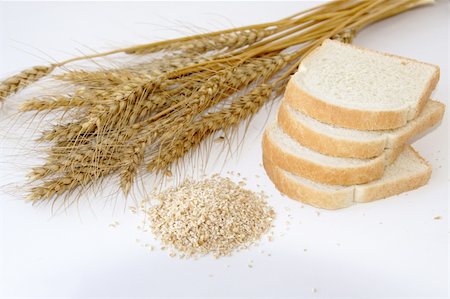 toast bread with crashed wheat & several stalks of wheat Stock Photo - Budget Royalty-Free & Subscription, Code: 400-04964087