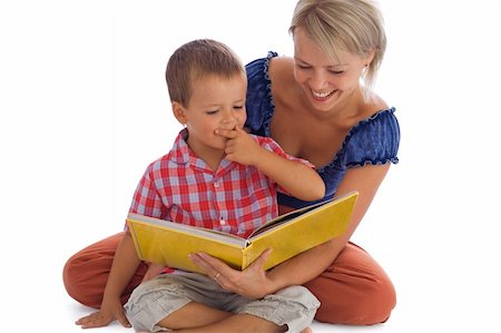 Woman and her little boy having fun reading a fairy tale - isolated on white with a bit of shadow Stock Photo - Budget Royalty-Free & Subscription, Code: 400-04964236