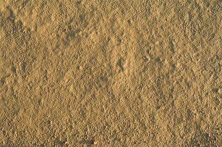 Fine grained dried mud background - in sunset lights Foto de stock - Super Valor sin royalties y Suscripción, Código: 400-04964244