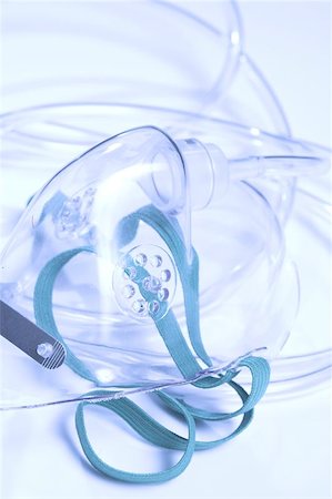 emergency supplies - oxygen mask over blue Stock Photo - Budget Royalty-Free & Subscription, Code: 400-04964799