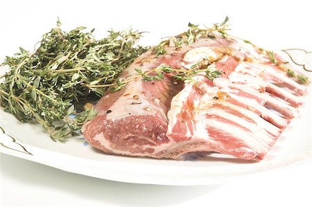 paper thin - lamb rib over white close up Foto de stock - Super Valor sin royalties y Suscripción, Código: 400-04964830