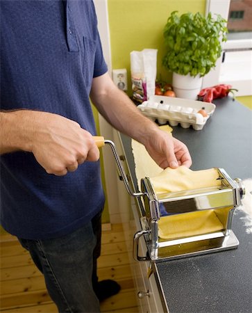 pasta maker - Making pasta in the kitchen Stock Photo - Budget Royalty-Free & Subscription, Code: 400-04964908