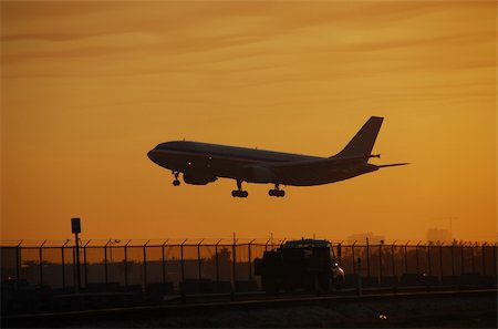 simsearch:400-04461341,k - Airplane arriving at destination in early morning Stock Photo - Budget Royalty-Free & Subscription, Code: 400-04965899