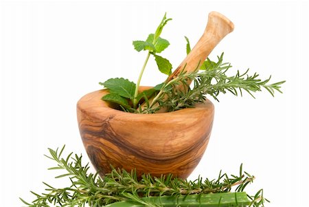 simsearch:400-04544414,k - Healing herbs on white background (handcarved olive tree mortar and pestle) Stock Photo - Budget Royalty-Free & Subscription, Code: 400-04965981