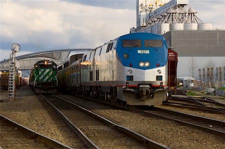 P-40 Diesel Locomotive passing a Freight Train in a rail yard Stock Photo - Budget Royalty-Free & Subscription, Code: 400-04968117