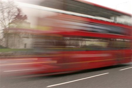 London Bus moving through the shot creating a blurred image Stock Photo - Budget Royalty-Free & Subscription, Code: 400-04968677