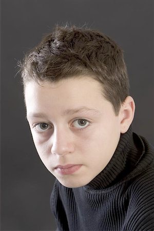 portrait of a teenage male against black background Stock Photo - Budget Royalty-Free & Subscription, Code: 400-04969227