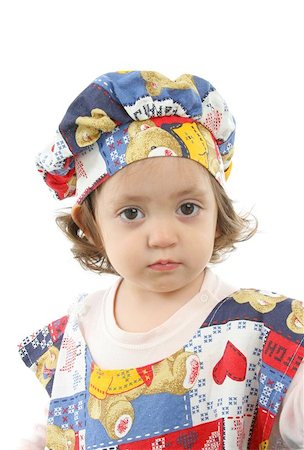 Cute toddler dressed as a chef (portrait). More pictures of this baby at my gallery Stock Photo - Budget Royalty-Free & Subscription, Code: 400-04969240