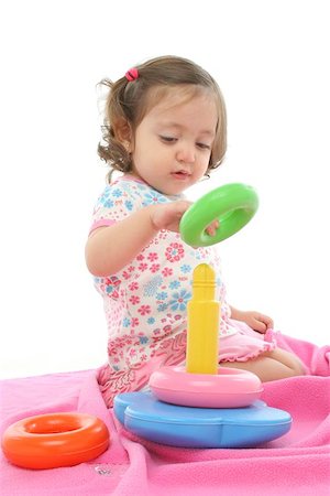 simsearch:400-04140663,k - Little girl playing and having fun with generic toy. More pictures of this baby at my gallery Photographie de stock - Aubaine LD & Abonnement, Code: 400-04969506