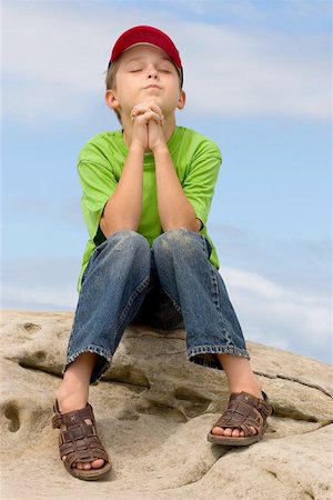 simsearch:400-04178541,k - A child in prayer Photographie de stock - Aubaine LD & Abonnement, Code: 400-04969554