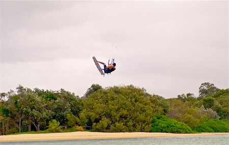deltaplano - Hang gliding kites on the beach Gold Coast Australia Fotografie stock - Microstock e Abbonamento, Codice: 400-04960482
