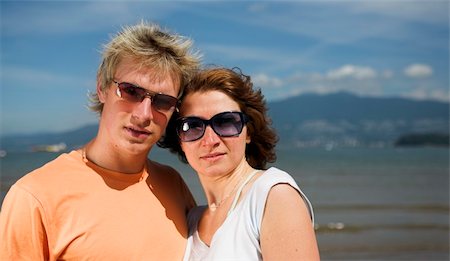 young couple posing on the beach in vancouver Stock Photo - Budget Royalty-Free & Subscription, Code: 400-04960662