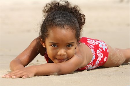 Cute little girl on a beach Stock Photo - Budget Royalty-Free & Subscription, Code: 400-04960681