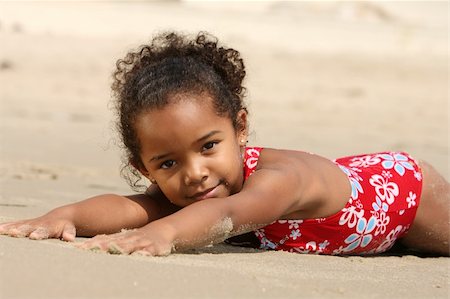 Cute little girl on a beach Stock Photo - Budget Royalty-Free & Subscription, Code: 400-04960682