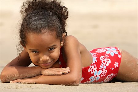 Cute little girl on a beach Stock Photo - Budget Royalty-Free & Subscription, Code: 400-04960891