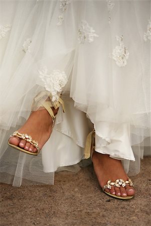 Wedding shoes on barefooted legs of the bride Stock Photo - Budget Royalty-Free & Subscription, Code: 400-04961930