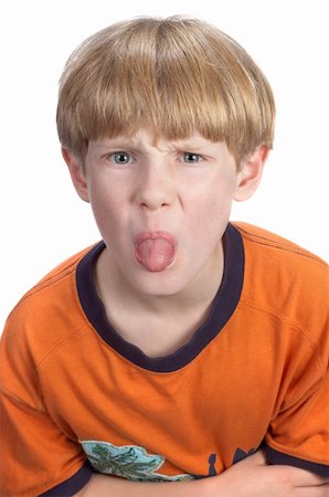blong boy displeased and sticking out the tongue. isolated on white. Stock Photo - Budget Royalty-Free & Subscription, Code: 400-04962347