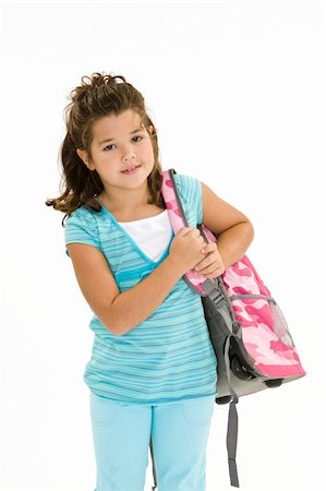 Child holding a school backpack and standing on a white background Stock Photo - Budget Royalty-Free & Subscription, Code: 400-04962352