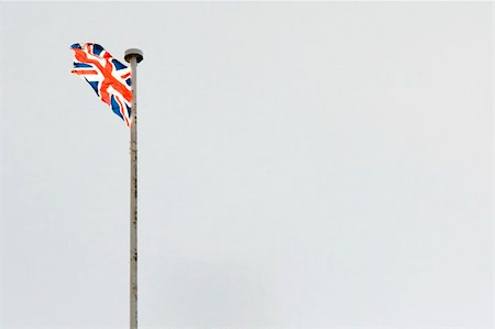 British flag flying proud in the sky... Stockbilder - Microstock & Abonnement, Bildnummer: 400-04962600