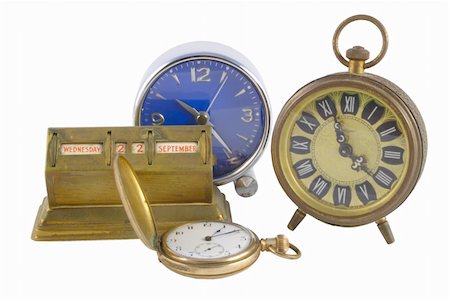 group of alarm clocks and an antique calendar Stock Photo - Budget Royalty-Free & Subscription, Code: 400-04962884