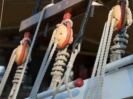 sailboat pulley - Old wooden pulley on a wooden sailboat Stock Photo - Budget Royalty-Free & Subscription, Code: 400-04963242