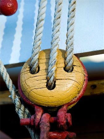 sailboat pulley - Old wooden pulley on a wooden sailboat Stock Photo - Budget Royalty-Free & Subscription, Code: 400-04963243