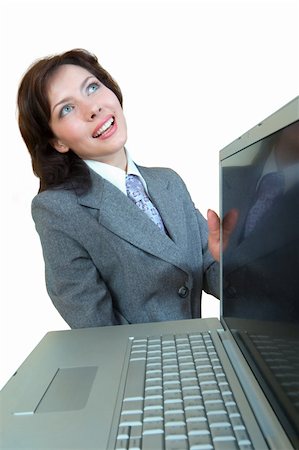 simsearch:400-05732500,k - Smiling girl with laptop in her hands. Isolated on white background Foto de stock - Royalty-Free Super Valor e Assinatura, Número: 400-04963573