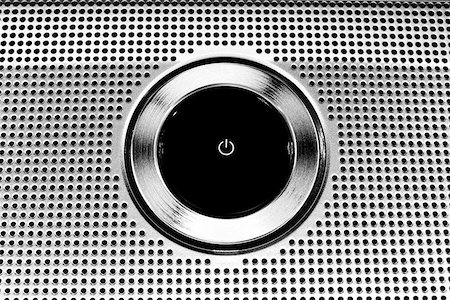 simsearch:400-07546122,k - Black Plastic Power Button close-up  More Metallic looks Stock Photo - Budget Royalty-Free & Subscription, Code: 400-04963728