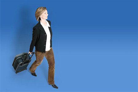 plane delay - businesswoman with luggage Stock Photo - Budget Royalty-Free & Subscription, Code: 400-04963934