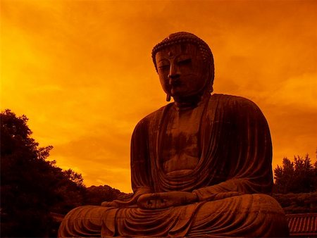 giant bronze Buddha statue in Kamakura Japan with dramatic sky background - taken with orange filter Stock Photo - Budget Royalty-Free & Subscription, Code: 400-04975001