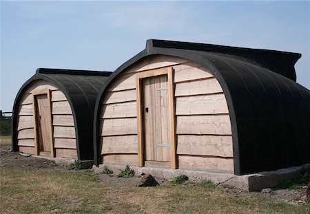 These traditional sheds at Holy Island are quite new after two older sheds in the same style burnt down some time ago. Foto de stock - Royalty-Free Super Valor e Assinatura, Número: 400-04975159