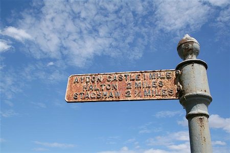 quevaal (artist) - Old English road sign in Northumberland Stockbilder - Microstock & Abonnement, Bildnummer: 400-04975164