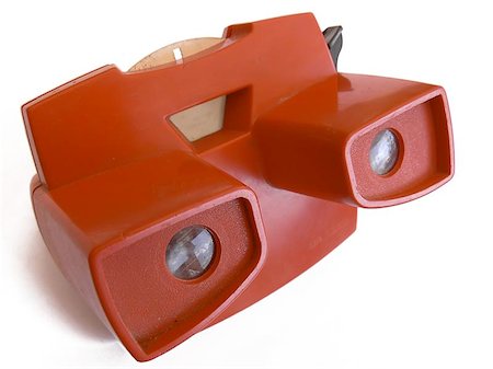 Viewmaster stereoscopic mage viewing toy, three-quarter front view, some differential focus; on white ground with soft shadow Stock Photo - Budget Royalty-Free & Subscription, Code: 400-04975423