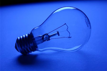 egypix (artist) - Light Bulb with blue background Stockbilder - Microstock & Abonnement, Bildnummer: 400-04976210