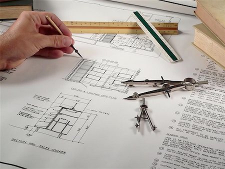 simsearch:400-04880387,k - An architect prepares a set of plans Stock Photo - Budget Royalty-Free & Subscription, Code: 400-04977274