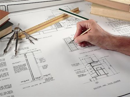 simsearch:400-04880387,k - An architect prepares a set of drawings Stock Photo - Budget Royalty-Free & Subscription, Code: 400-04977275