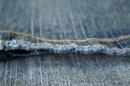simsearch:400-07770314,k - Jeans. The seam. The background.  The interesting invoice dark blue Jeans, macro  photo of a seam. Stock Photo - Budget Royalty-Free & Subscription, Code: 400-04977307