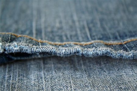 simsearch:400-05265987,k - Jeans. The seam. The background.  The interesting invoice dark blue Jeans, macro  photo of a seam. Foto de stock - Super Valor sin royalties y Suscripción, Código: 400-04977307