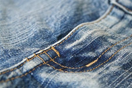 simsearch:400-07770314,k - Jeans. The seam. The background.  The interesting invoice dark blue Jeans, macro  photo of a seam. Stock Photo - Budget Royalty-Free & Subscription, Code: 400-04977309