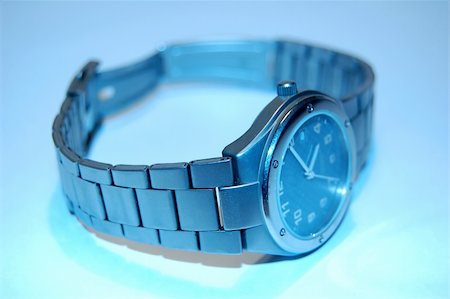 simsearch:400-04995560,k - wristwatch on paper Stock Photo - Budget Royalty-Free & Subscription, Code: 400-04977882