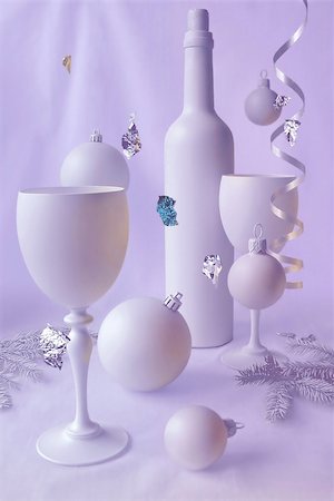 pic of drinking celebration for new year - Christmas still-life for a two in love. Two glasses for a two. Romantic and celebratory environment. A very original and unusual photo. Stock Photo - Budget Royalty-Free & Subscription, Code: 400-04977976