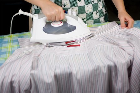 Dress shirt ironing Stock Photo - Budget Royalty-Free & Subscription, Code: 400-04978078