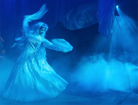 Blue dancing woman performing on the stage. Fotografie stock - Microstock e Abbonamento, Codice: 400-04978570
