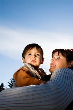 mother and son over blue sky Stock Photo - Budget Royalty-Free & Subscription, Code: 400-04978660