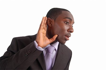 This is an image of a business man with his hand to his ear, as if to say "Say what?!". Fotografie stock - Microstock e Abbonamento, Codice: 400-04978895