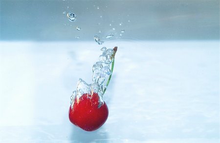 Cherry splashinh to water Stock Photo - Budget Royalty-Free & Subscription, Code: 400-04979019