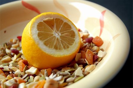 dry cured - This is an image of a lemon and some country mix fruit/cereal in a bowl. Stock Photo - Budget Royalty-Free & Subscription, Code: 400-04979010