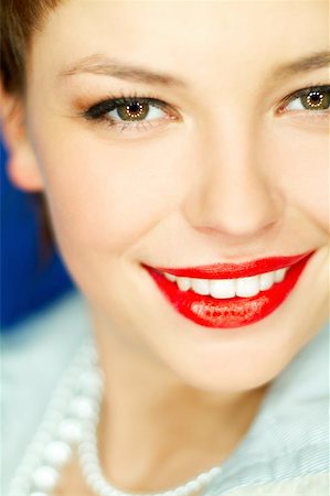 simsearch:400-03954263,k - Portrait of beautiful young smiling woman with red lipstick Photographie de stock - Aubaine LD & Abonnement, Code: 400-04970064