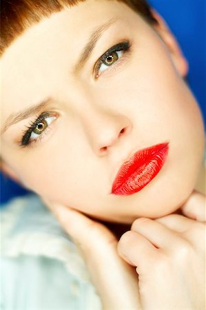 simsearch:400-03954263,k - Portrait of beautiful young woman with red lipstick Photographie de stock - Aubaine LD & Abonnement, Code: 400-04970067