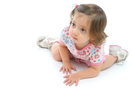 simsearch:400-04373087,k - Beauty toddler on the floor with a beautiful expression (portrait). More pictures of this baby at my gallery Photographie de stock - Aubaine LD & Abonnement, Code: 400-04971179